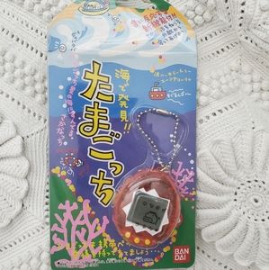 Orange/red Tamagotchi Ocean